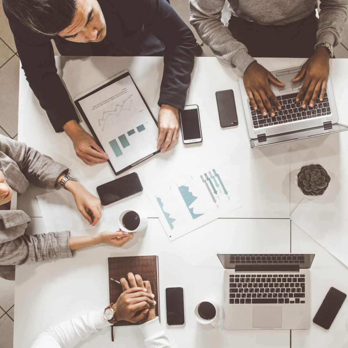 top view of a group of people having a meeting at the office